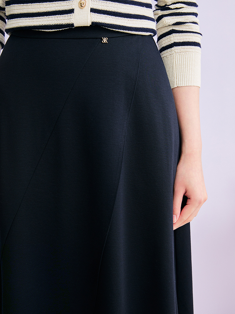 YINER音儿2026春季新款时尚莱赛尔羊毛混纺不规则波浪边A型半身裙8C36150330