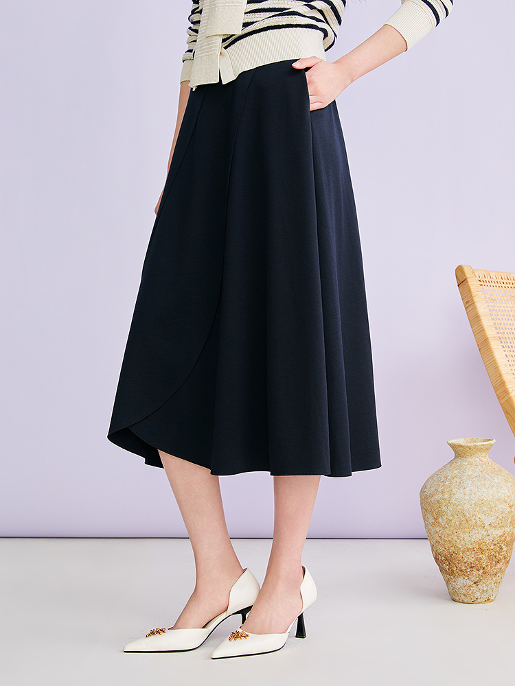 YINER音儿2026春季新款时尚莱赛尔羊毛混纺不规则波浪边A型半身裙8C36150330