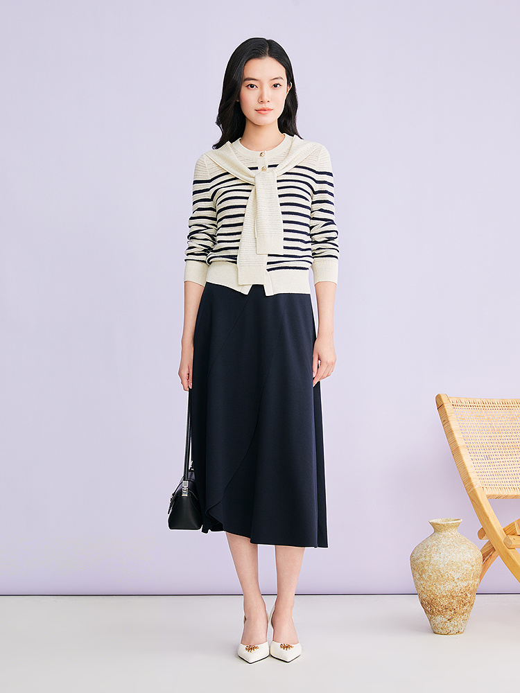 YINER音儿2026春季新款时尚莱赛尔羊毛混纺不规则波浪边A型半身裙8C36150330